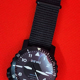A black dial watch with a black fabric NATO-style strap, photographed on a bright red textured background. The brand name 'DIEVAS' is visible on the watch dial.

